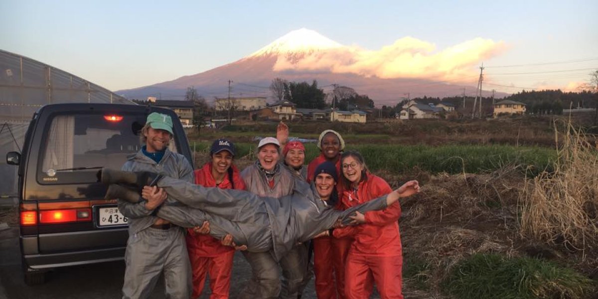 Students in front of a mountain