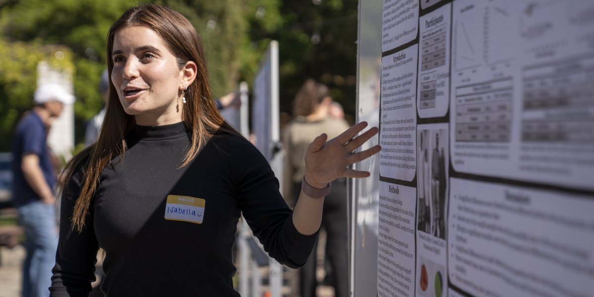 Student presenting research