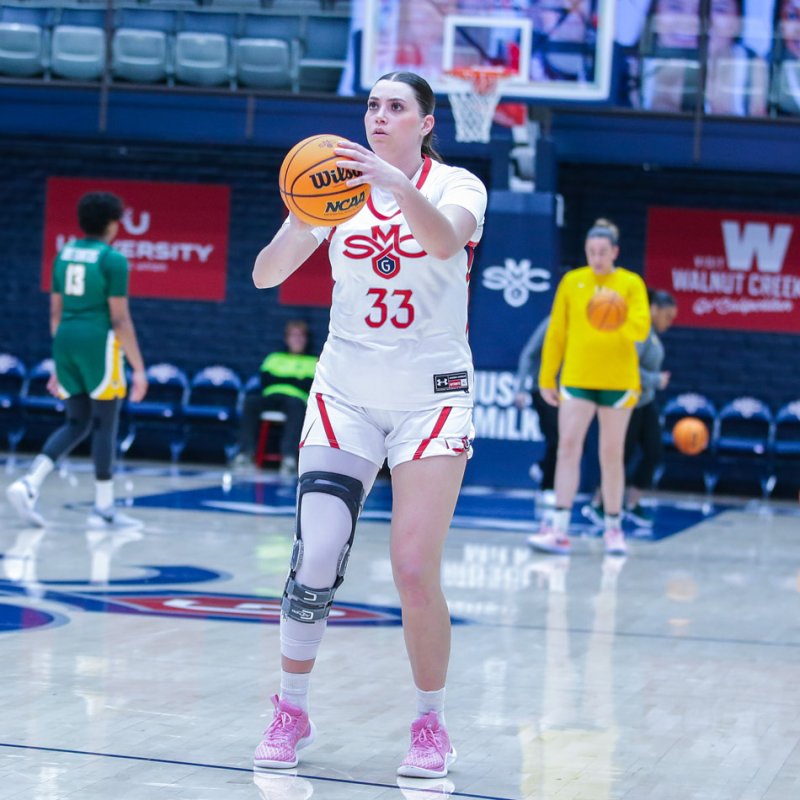 Women's basketball player Ali Bamberger prepares to shoot