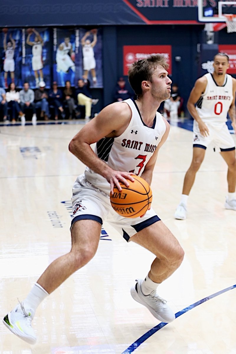 Men's basketball player Augustas Marciulionis prepares to shoot against Cal Poly in November 2024