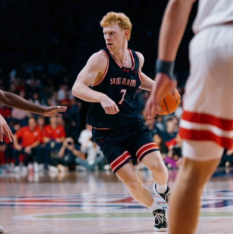 Men's Basketball player Joshua Dent drives against Arizona in October 2025