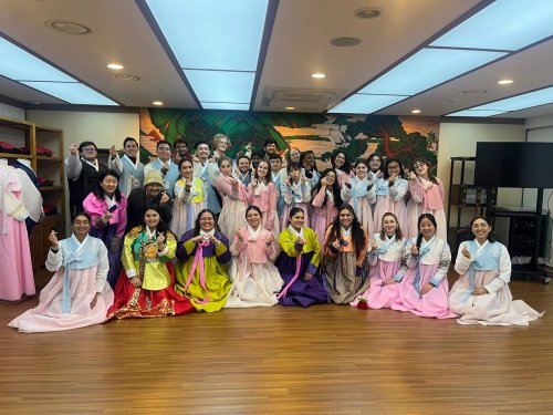 Group photo in colorful dresses in South Korean studio
