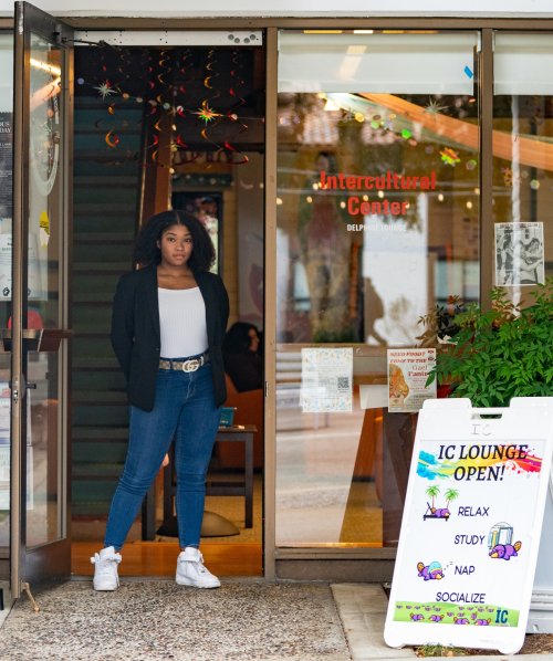 Alexis Hackett in the doorway of the Intercultural Center