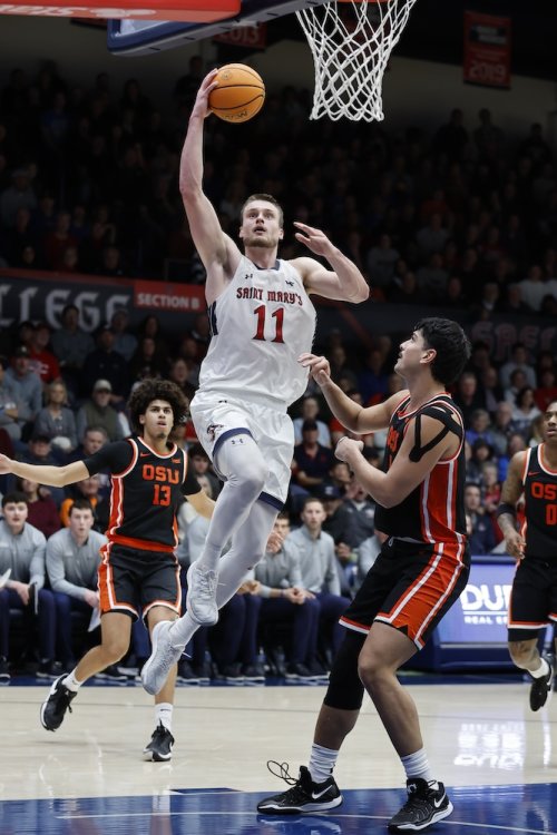Men's Basketball player Mitchell Saxen shoots against Oregon State on March 1, 2025