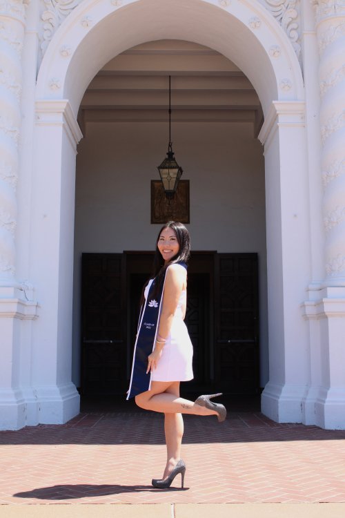 Callista Yu posing in graduation stole on SMC campus