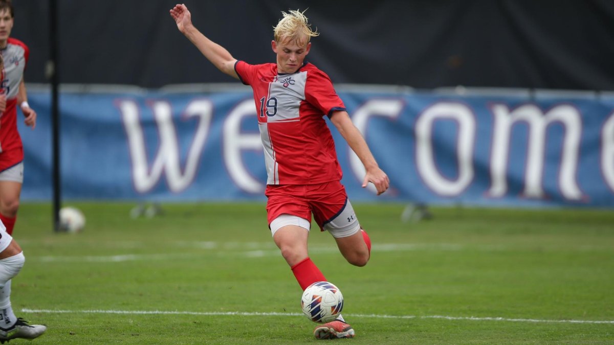 Men's soccer player Toke Amtrup shoots against USF in October 2023