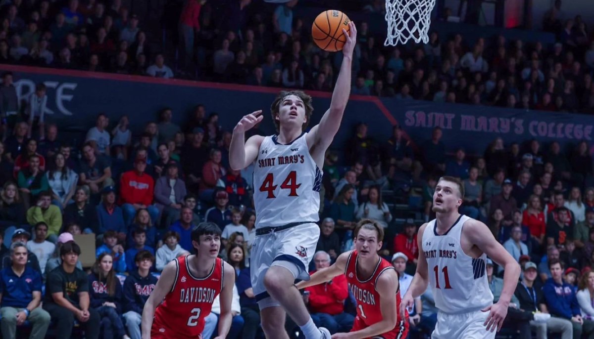 Alex Ducas drives against Davidson 