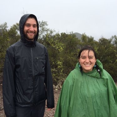 2 EES students in the rain on a field trip to an outdoor location
