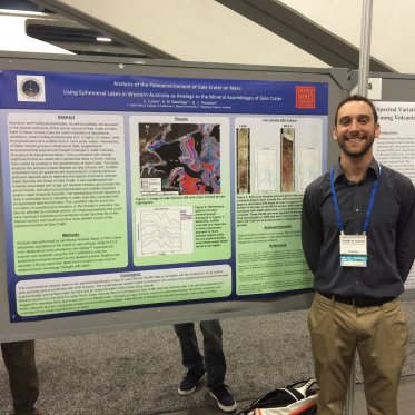 EES student presenting summer research poster