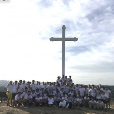 Rugby team photo at the cross
