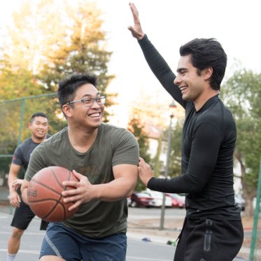 Students playing basketball