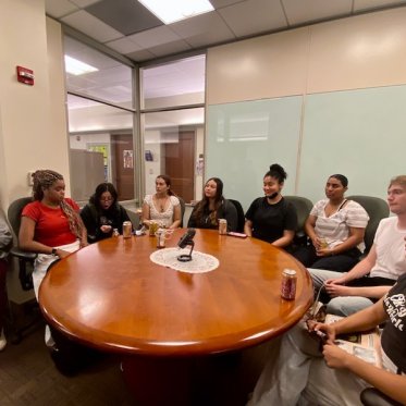 people setting around the table