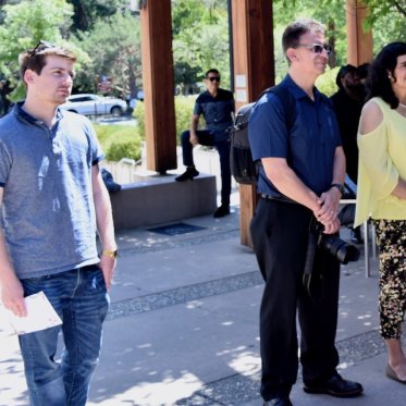 two women standing in line
