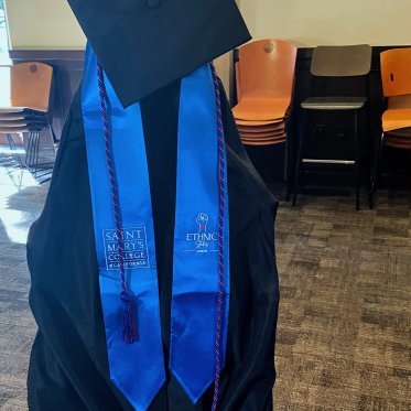 picture of graduation apron and cap 