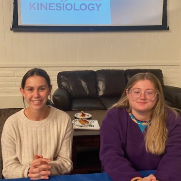 picture of 2 people sitting