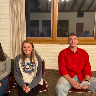 picture of 3 people sitting