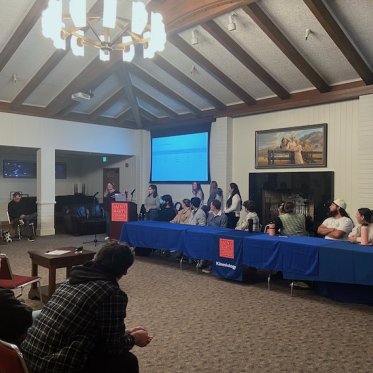 people sitting in a meeting and seeing the presentation