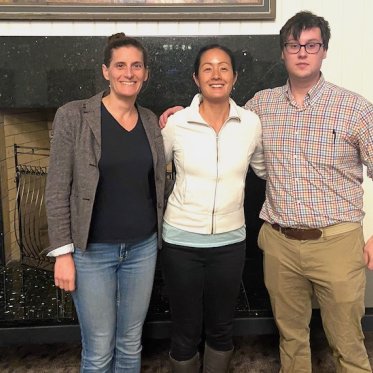 picture of 3 people standing