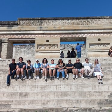 Students sitting on steps