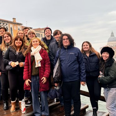 Students on a bridge in Venice