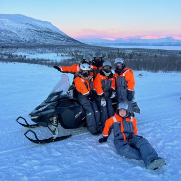 Students on a snowmobile