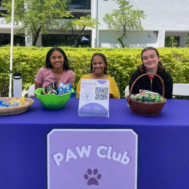 Students at a PAW club booth