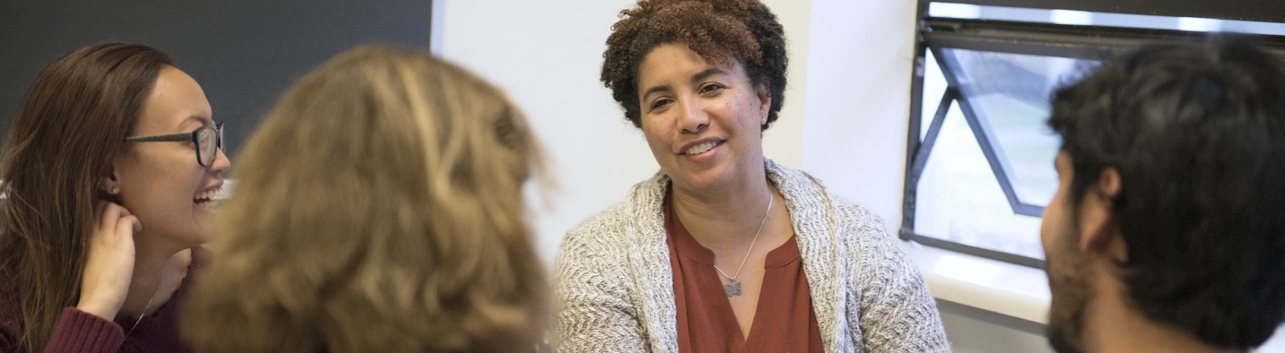 A professor is talking to students