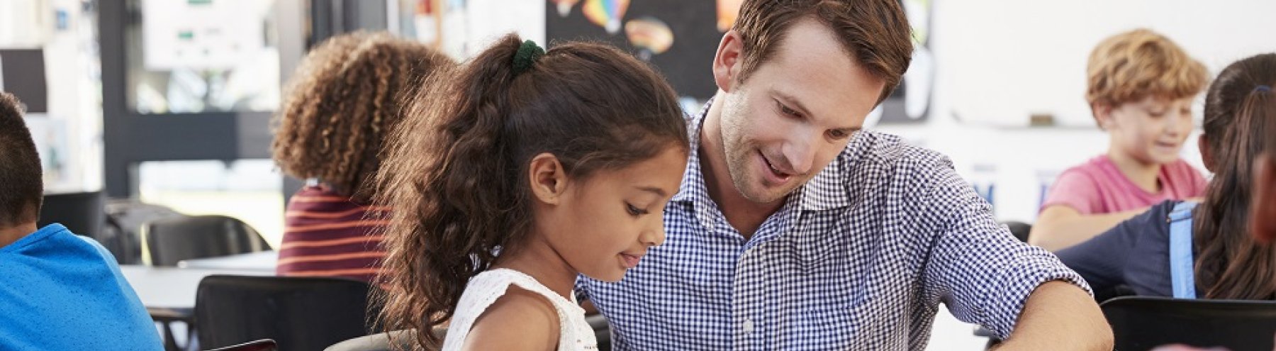 male teacher with student