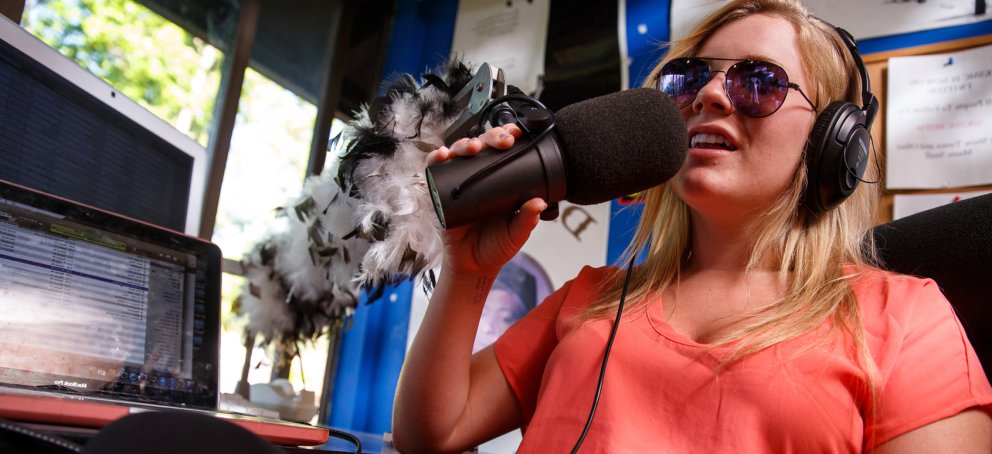 A student hosting a radio show