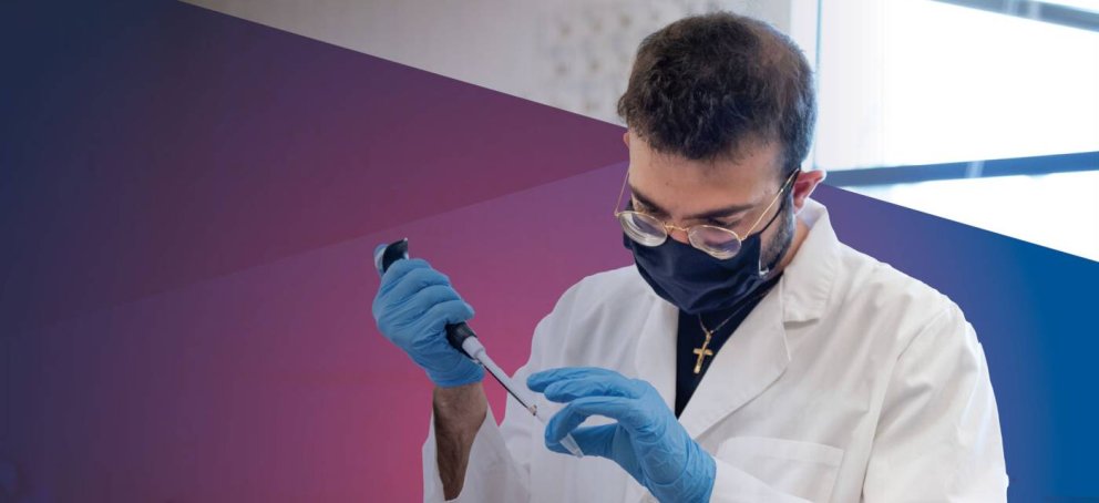 Saint Mary's Biotech student performing an experiment.