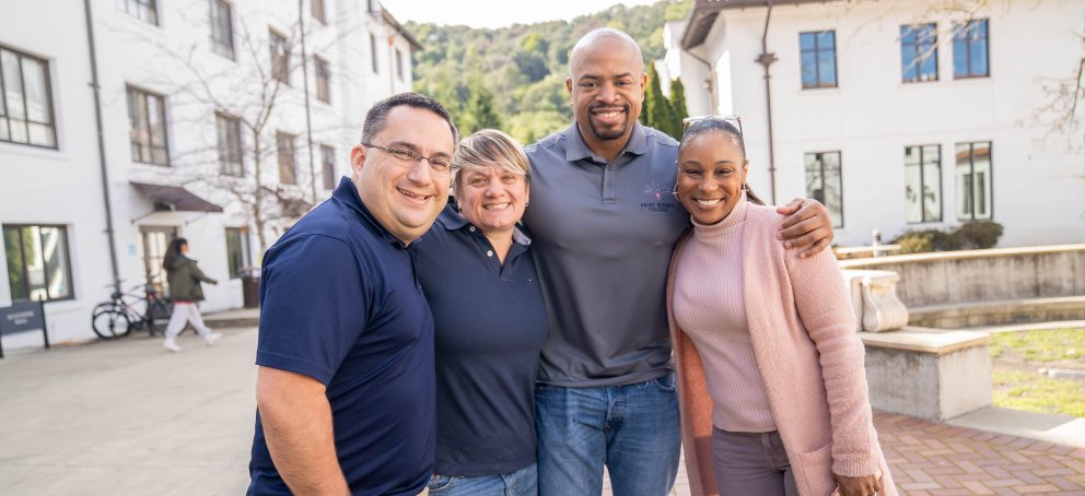 KSOE Students standing between Filippi Academic Hall and Augustine Hall