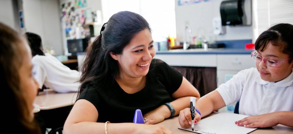 A teacher with her elementary school class