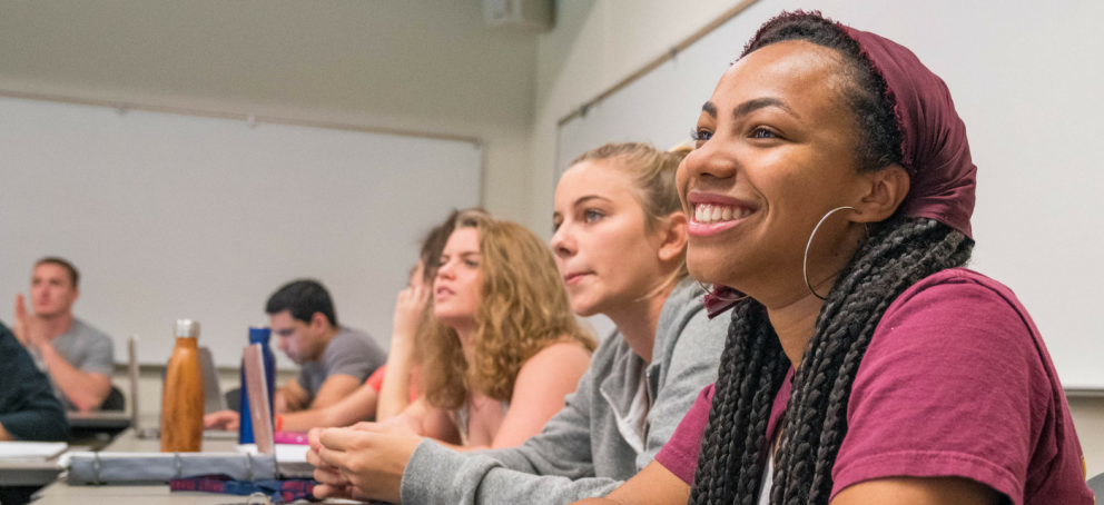 MA in Communication students discussing in class