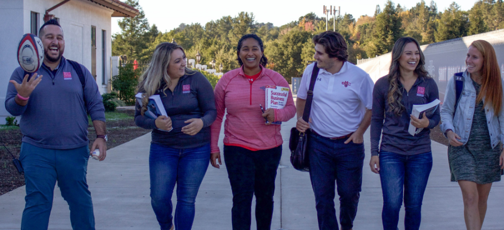 7 kinesiology students walking abreast
