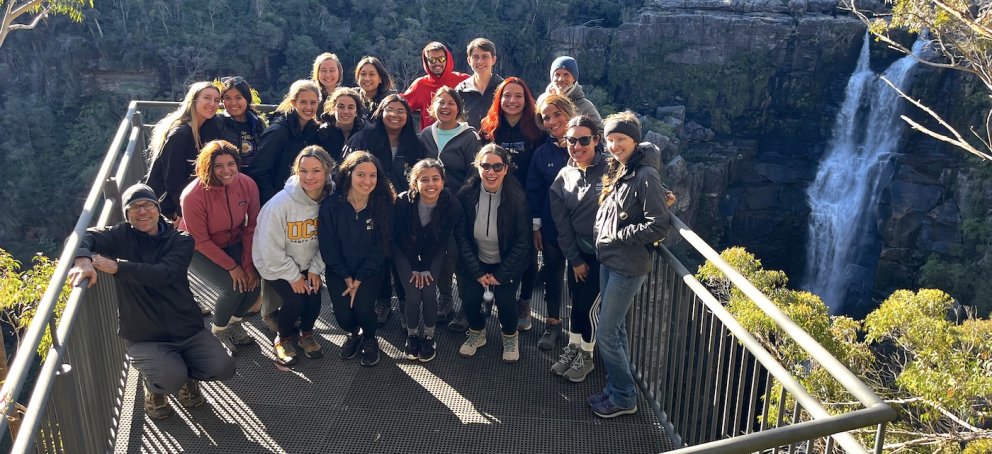 Students by a waterfall