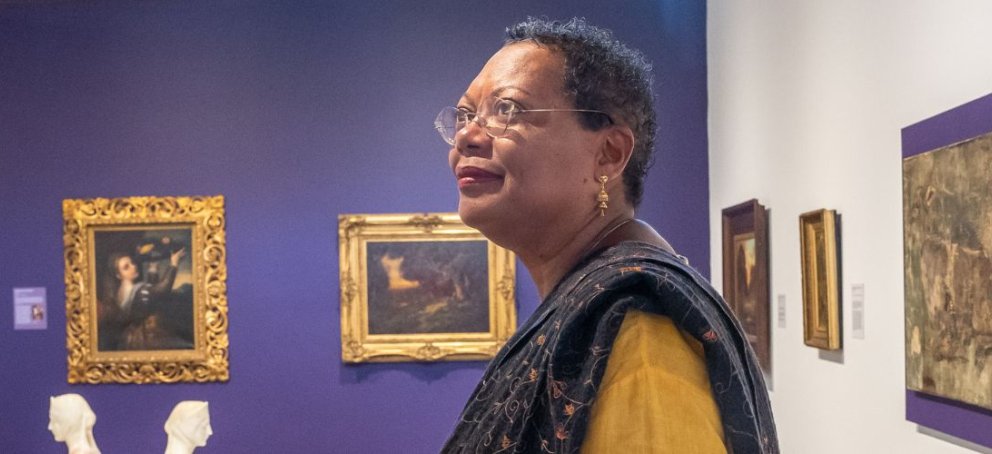 visitor in the galleries looking at art