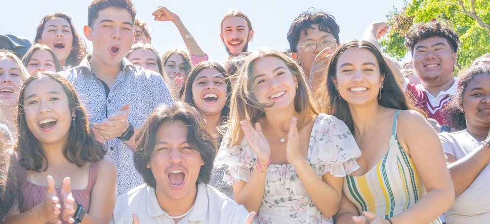 excited students on a sunny day