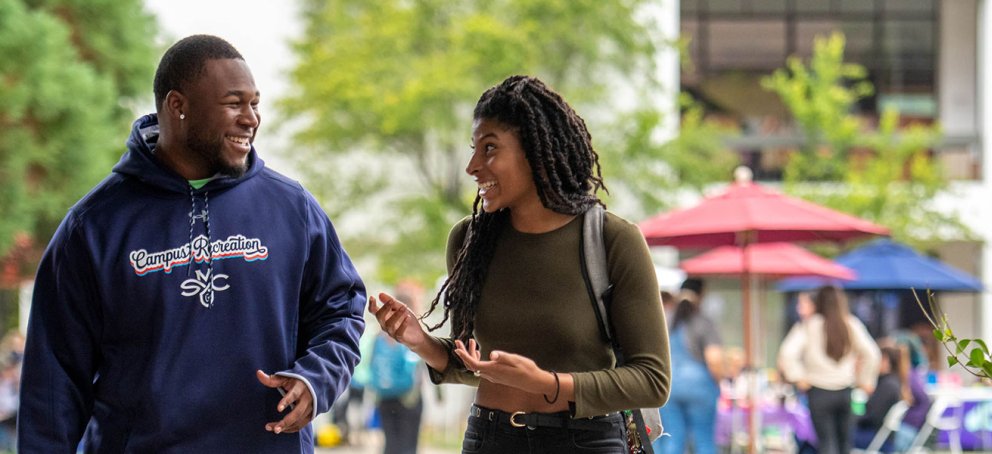 two students walking outside