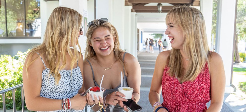 three students eating ice cream