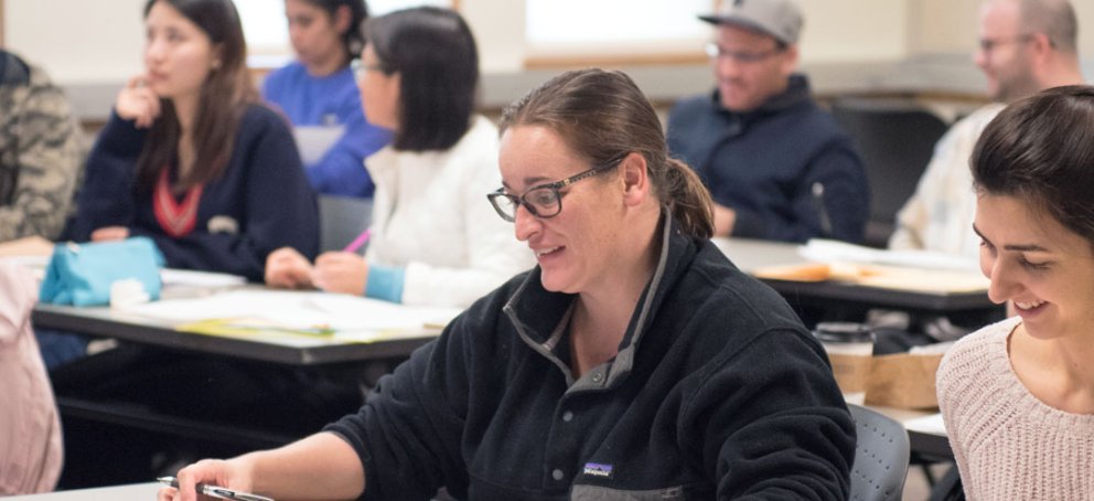 classroom of smiling accounting students from the accounting department
