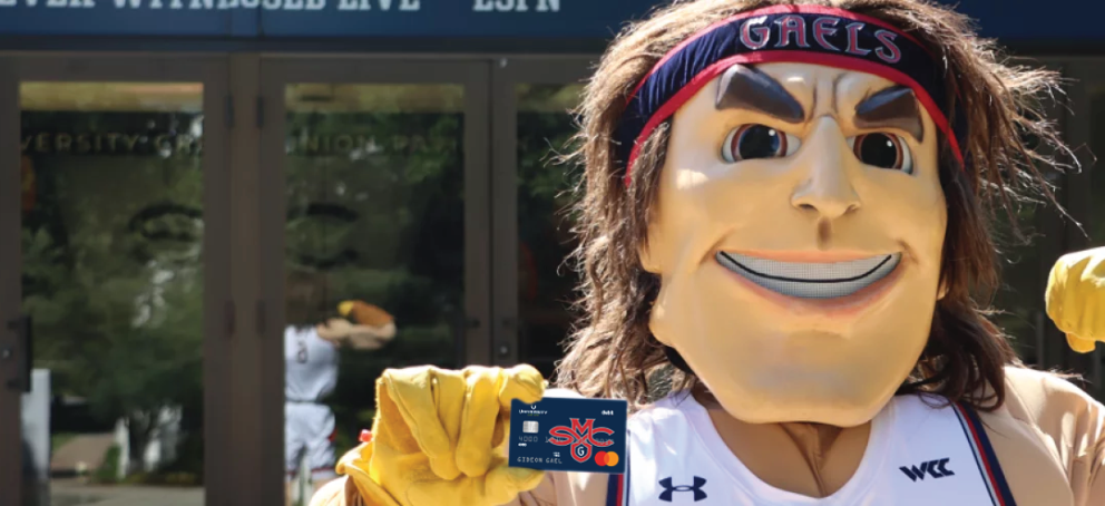 Gideon the gael holding credit card