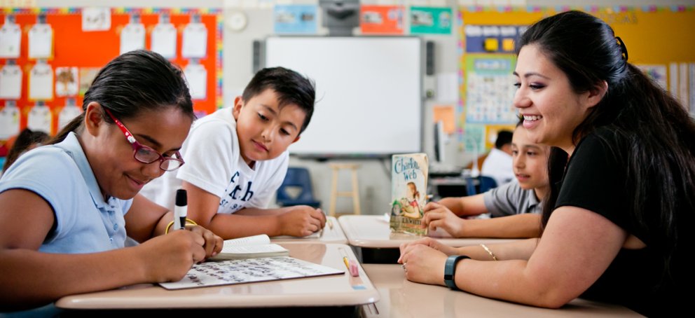 A teacher in a classroom with students