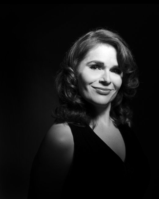 A black-and-white headshot of Amy Stabnau