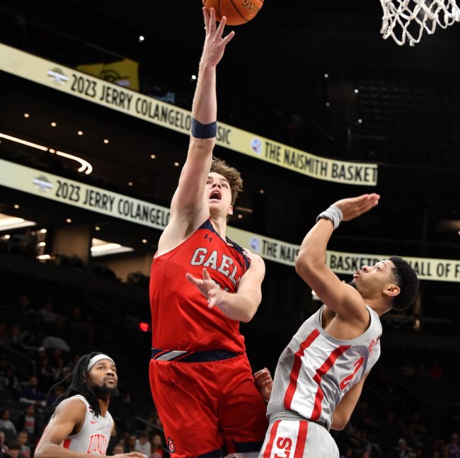 Men's basketball player Alex Ducas shoots against UNLV in December 2023