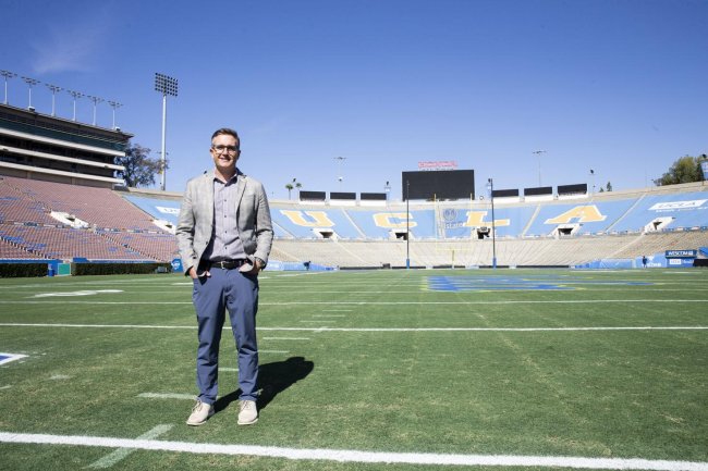 Jens Weiden stands on the field at the Rose Bowl