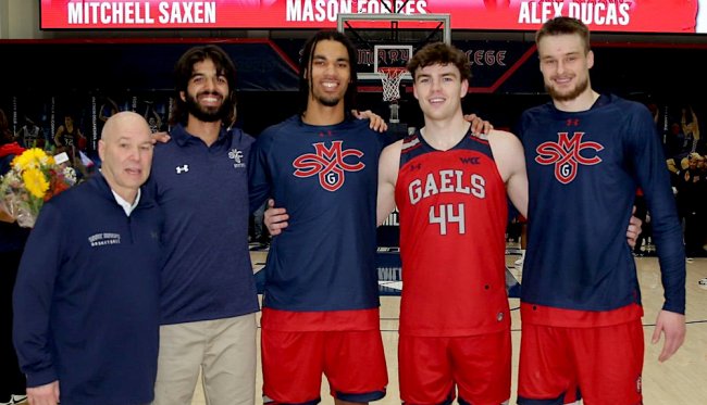 Men's basketball coach Randy Bennett with 3 players and one manager, March 2024
