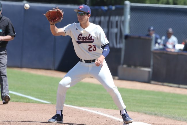 First baseman Christian Almanza catches a throw at first base, 2024