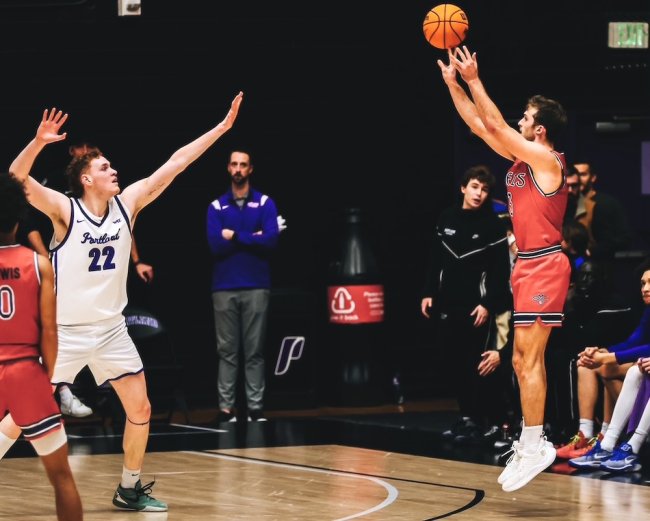 Men's basketball player Augustus Marciulionis shoots against Portland in January 2025