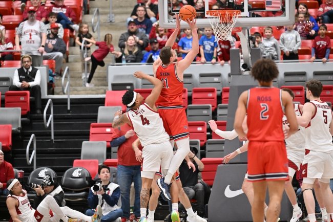 Men's basketball player Mitchell Saxen shoots against WSU in January 2025