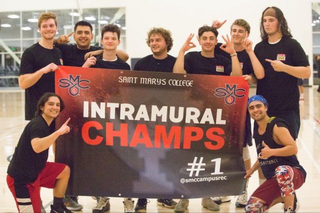 intramural basketball champs with sign